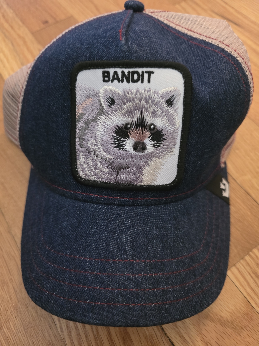 The Farm Bandit Raccoon Trucker Hat
